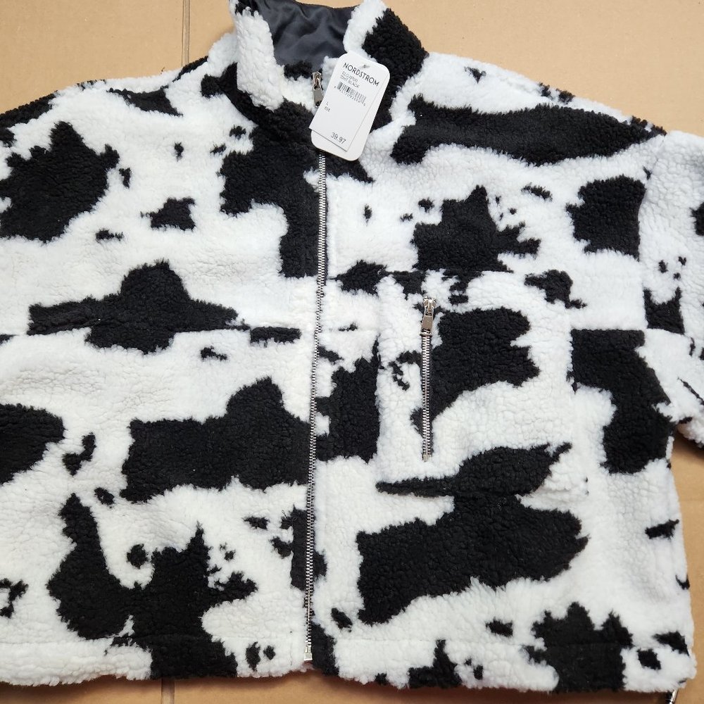 Black and white jacket.